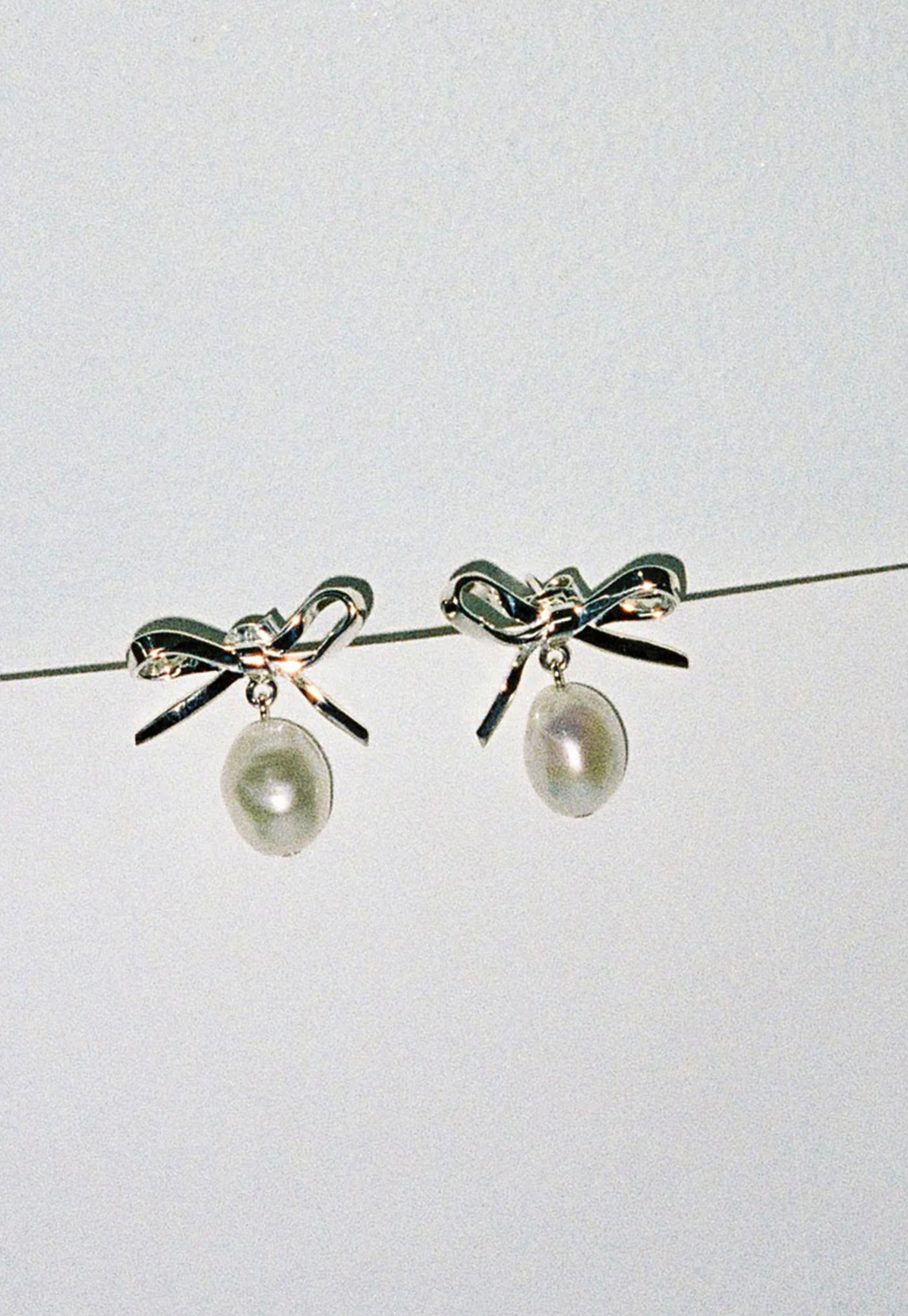 Bow Pearl Stud Earrings