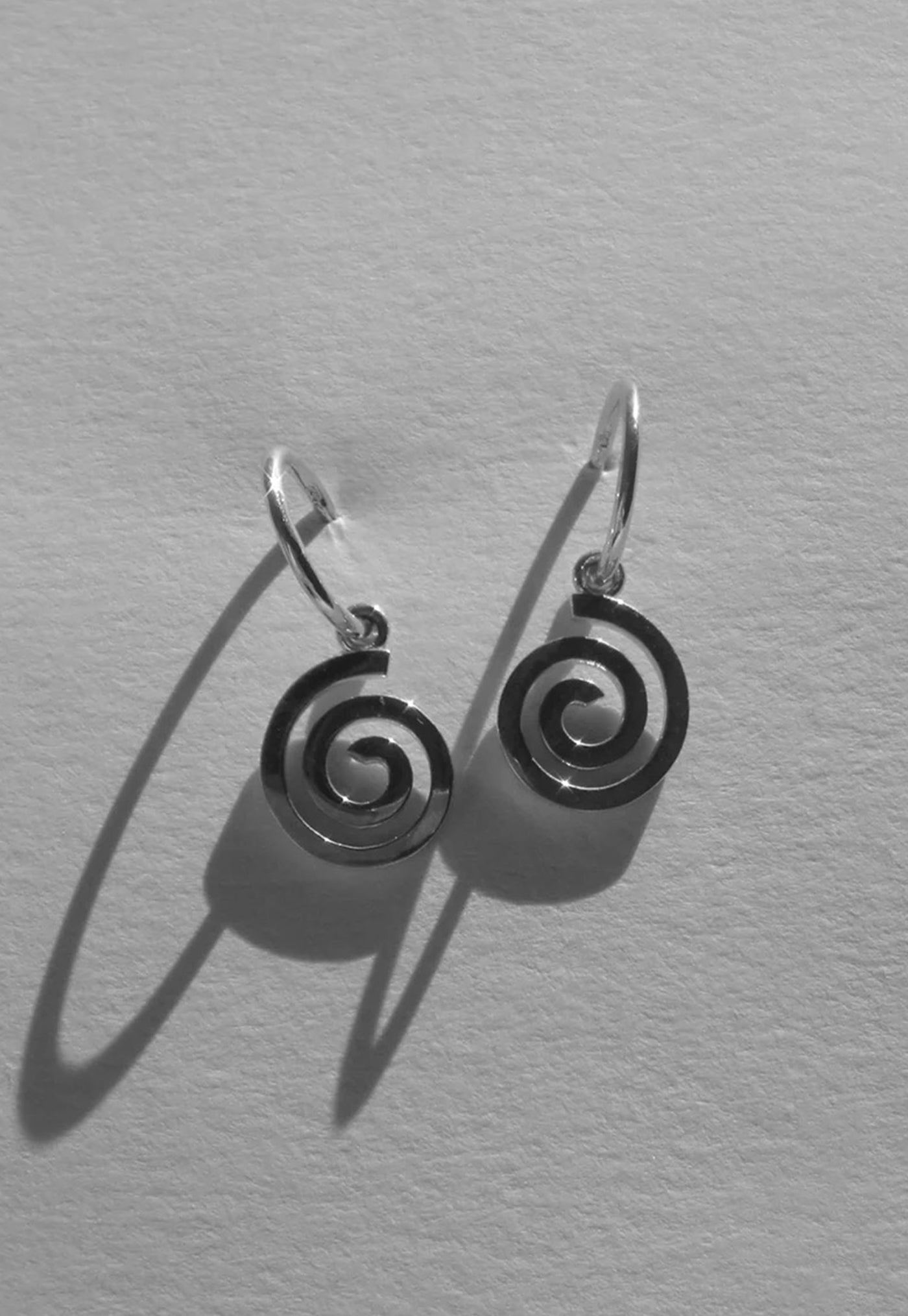 Spiral Signature Hoops sold by Angel Divine